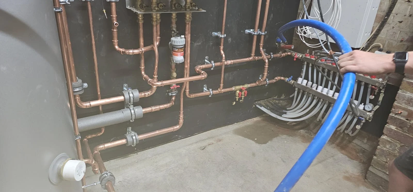 Low-level copper pipework and service connections