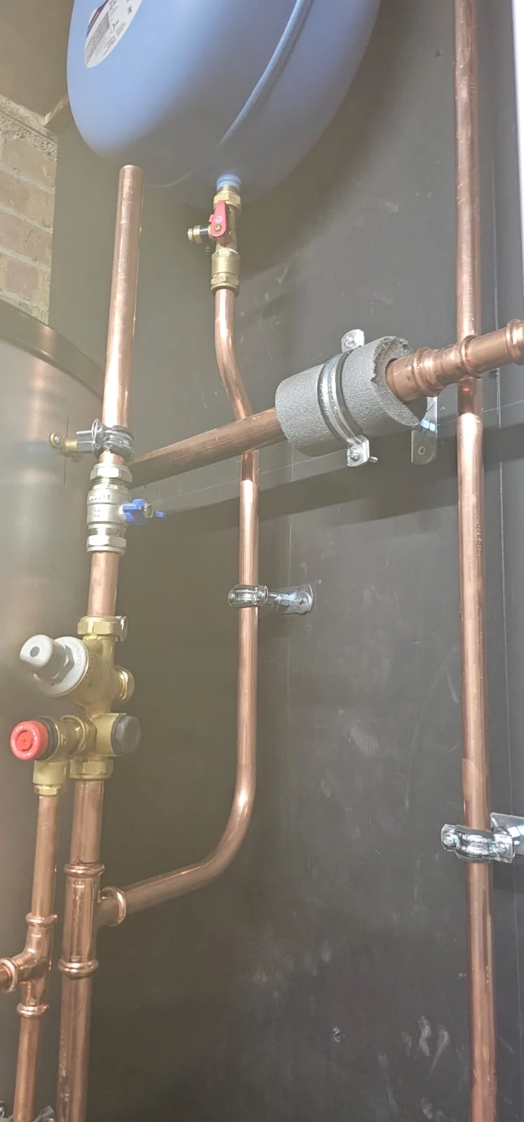 Copper valves beneath the expansion vessel