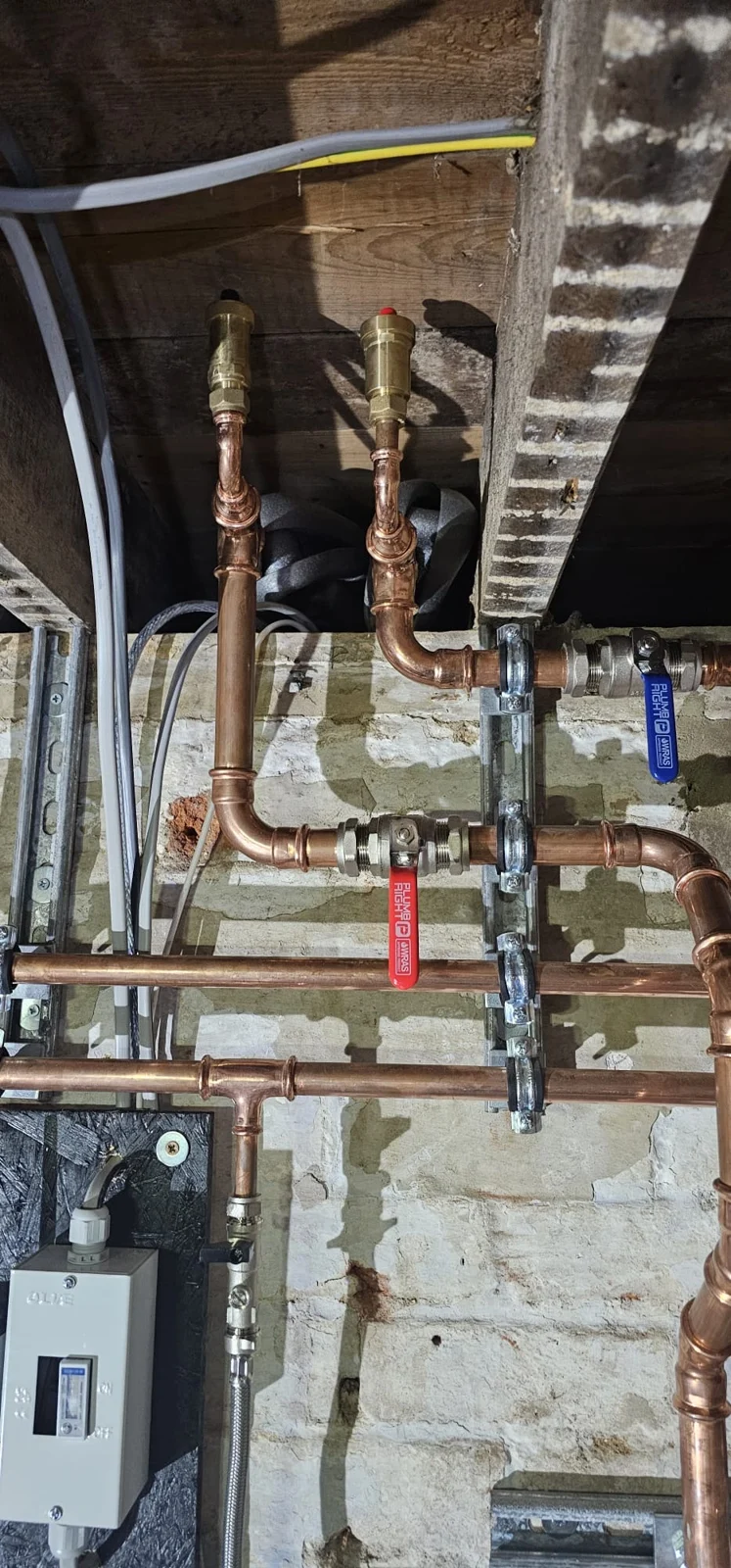 High-level pipework, valves and open ceiling