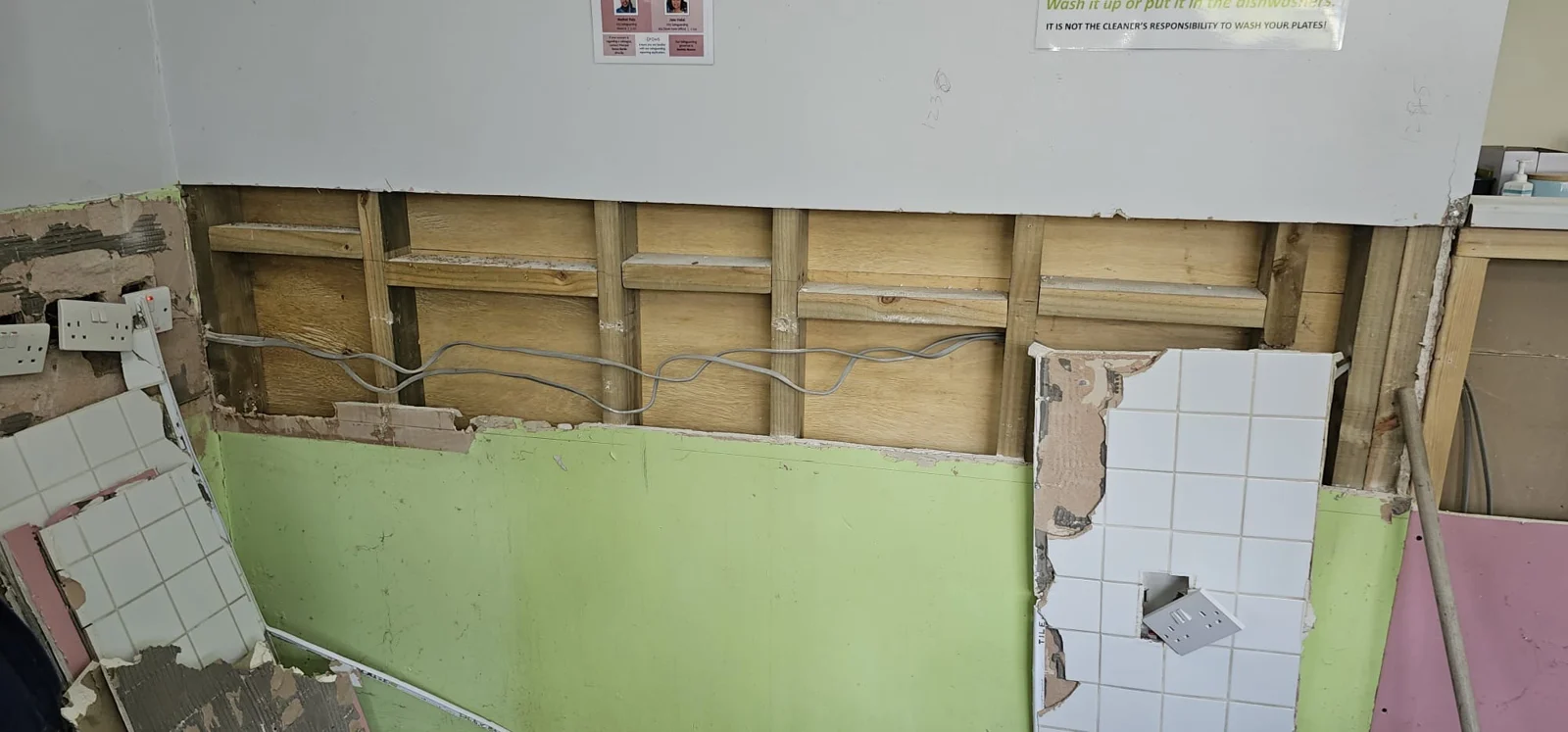 Wall opened behind the kitchen units