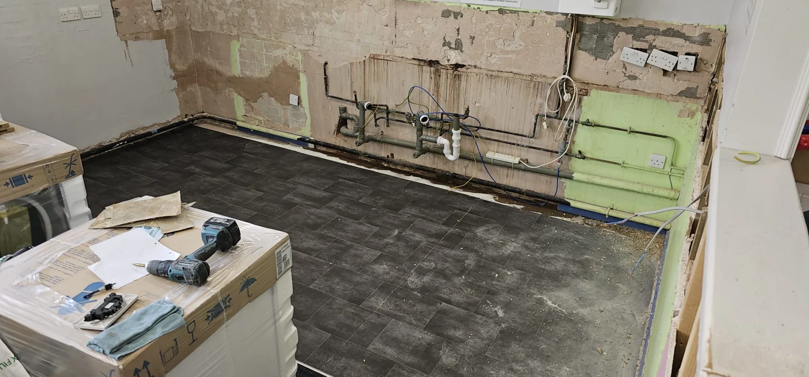 Kitchen strip-out and exposed plumbing