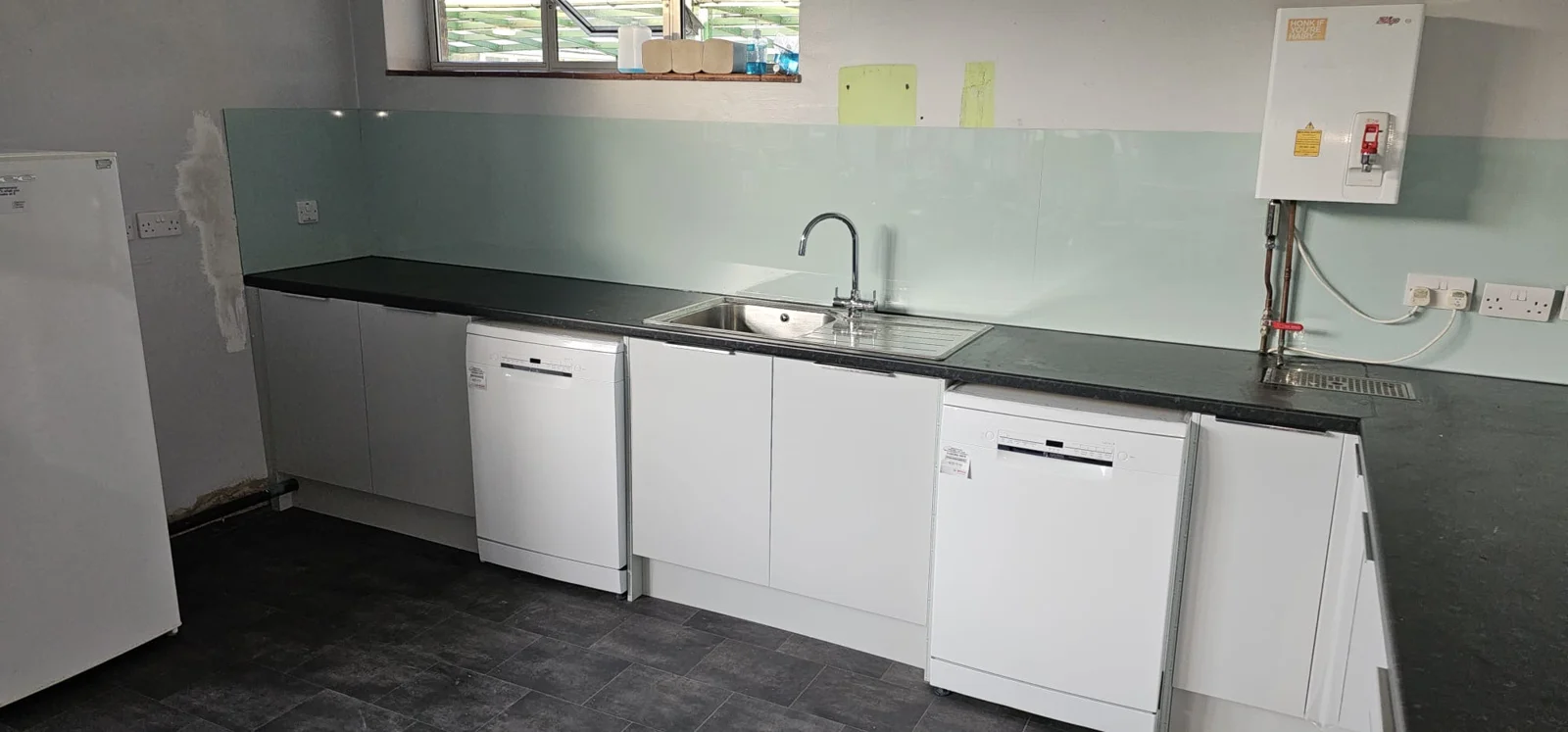 White base units and stainless steel sink