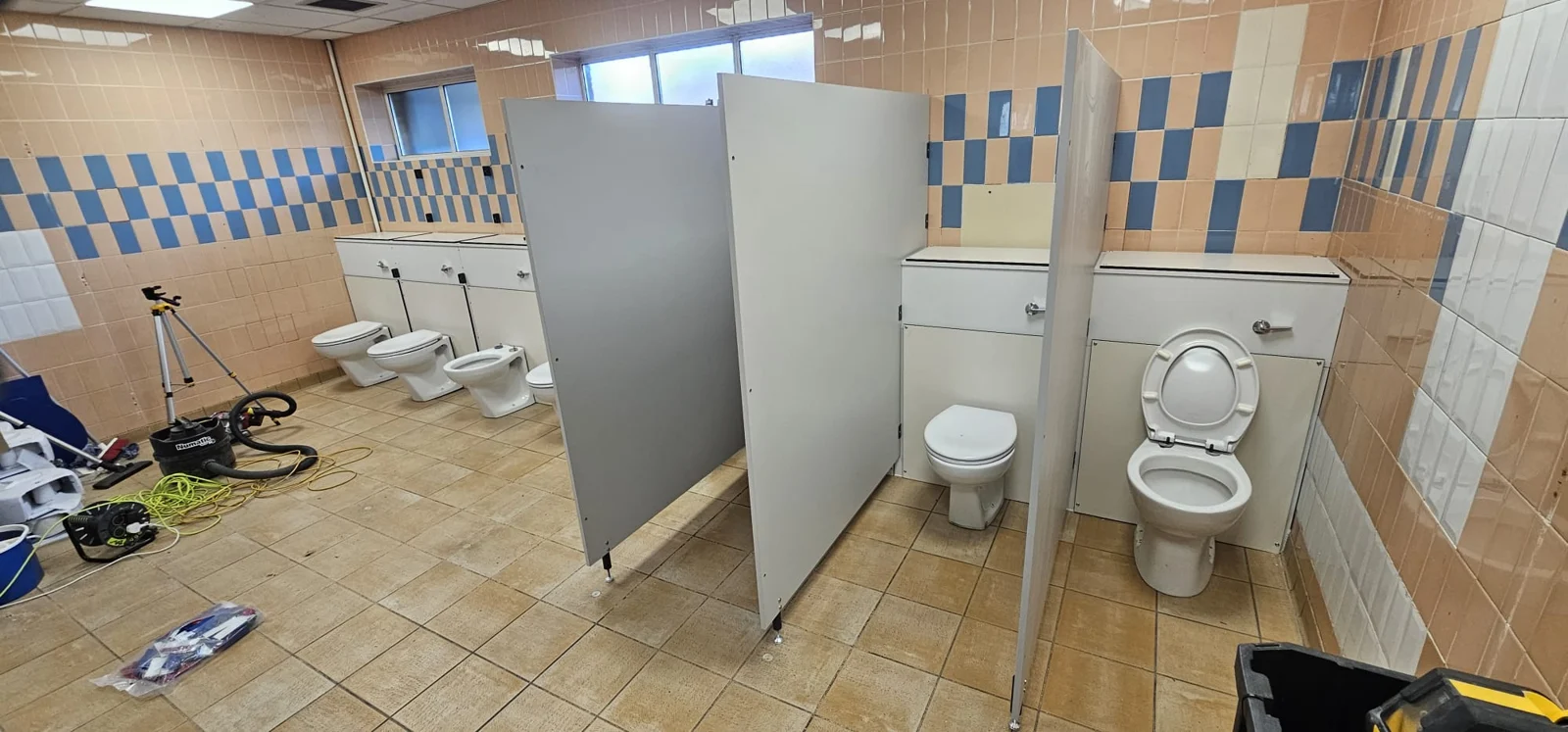 Toilet fittings and cubicle partitions